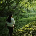 Hiker walking a forest trail without GPS signal